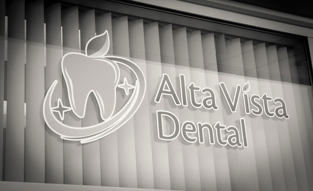 The image shows a sign with the text  ALTA VISTA DENTAL  displayed prominently against a blurred background, suggesting that this is an advertisement for a dental clinic named Altavista Dental.