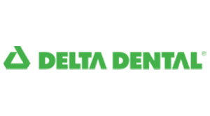 The image features a logo with the text  DELTA DENTAL  on a white background, followed by a green triangle with the word  DENTAL  inside it, set against a gray gradient backdrop.