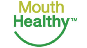 The image features a logo with the text  Mouth Healthy  prominently displayed, along with a graphic of a toothbrush and a smile, suggesting that the logo represents an organization or product related to oral hygiene or dental health.